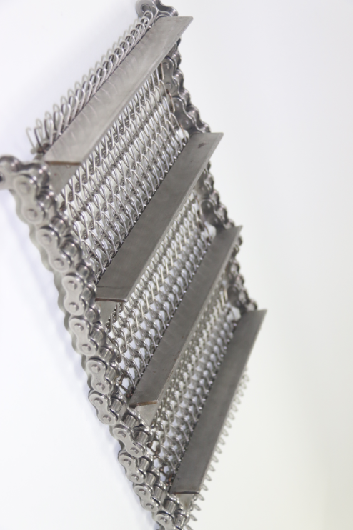 金屬輸送帶使用驅(qū)動滾筒進(jìn)行輸送